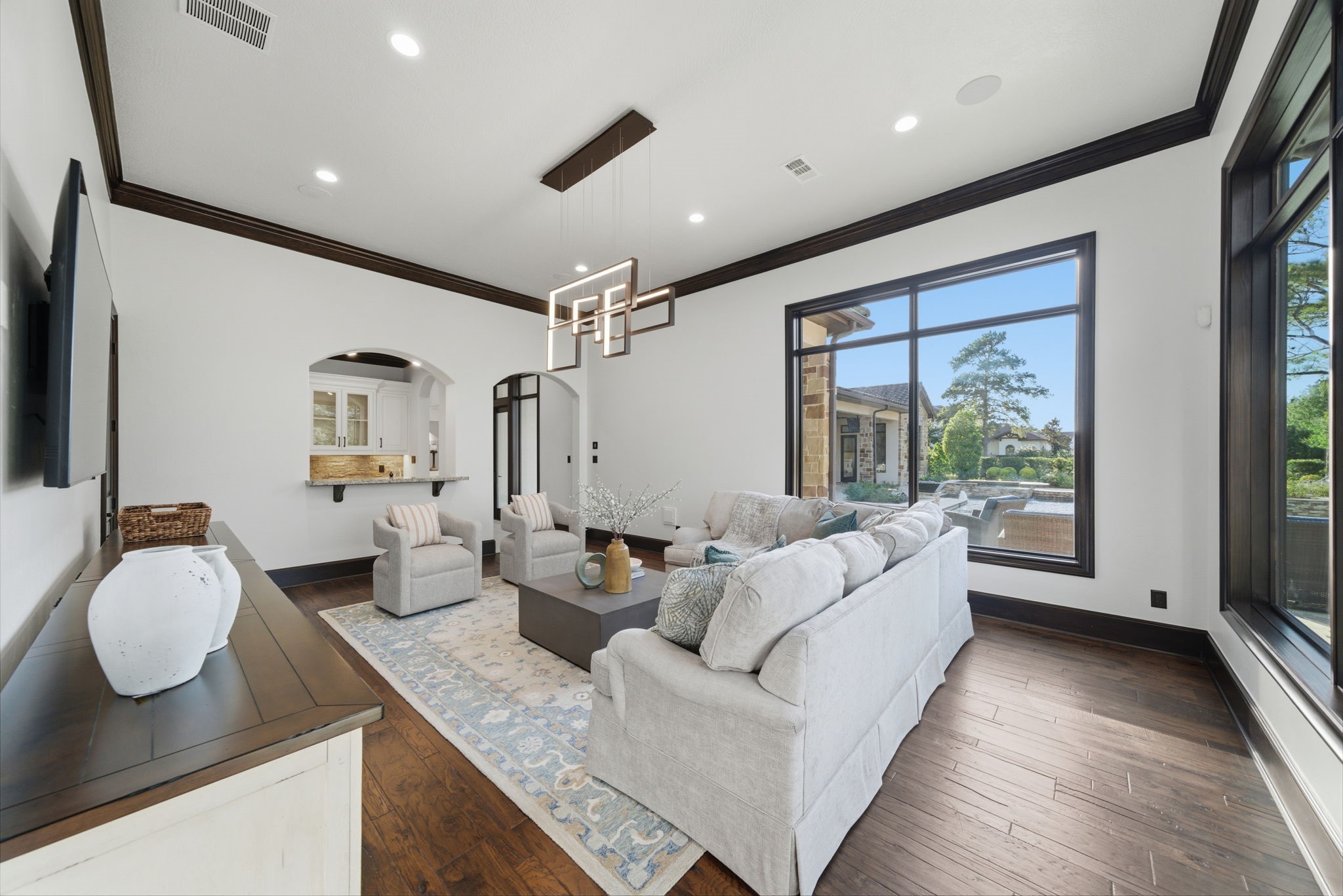 15 Royal King Road Tomball, TX 77377 - Photo 28 of 50 a living room with furniture and a large window
