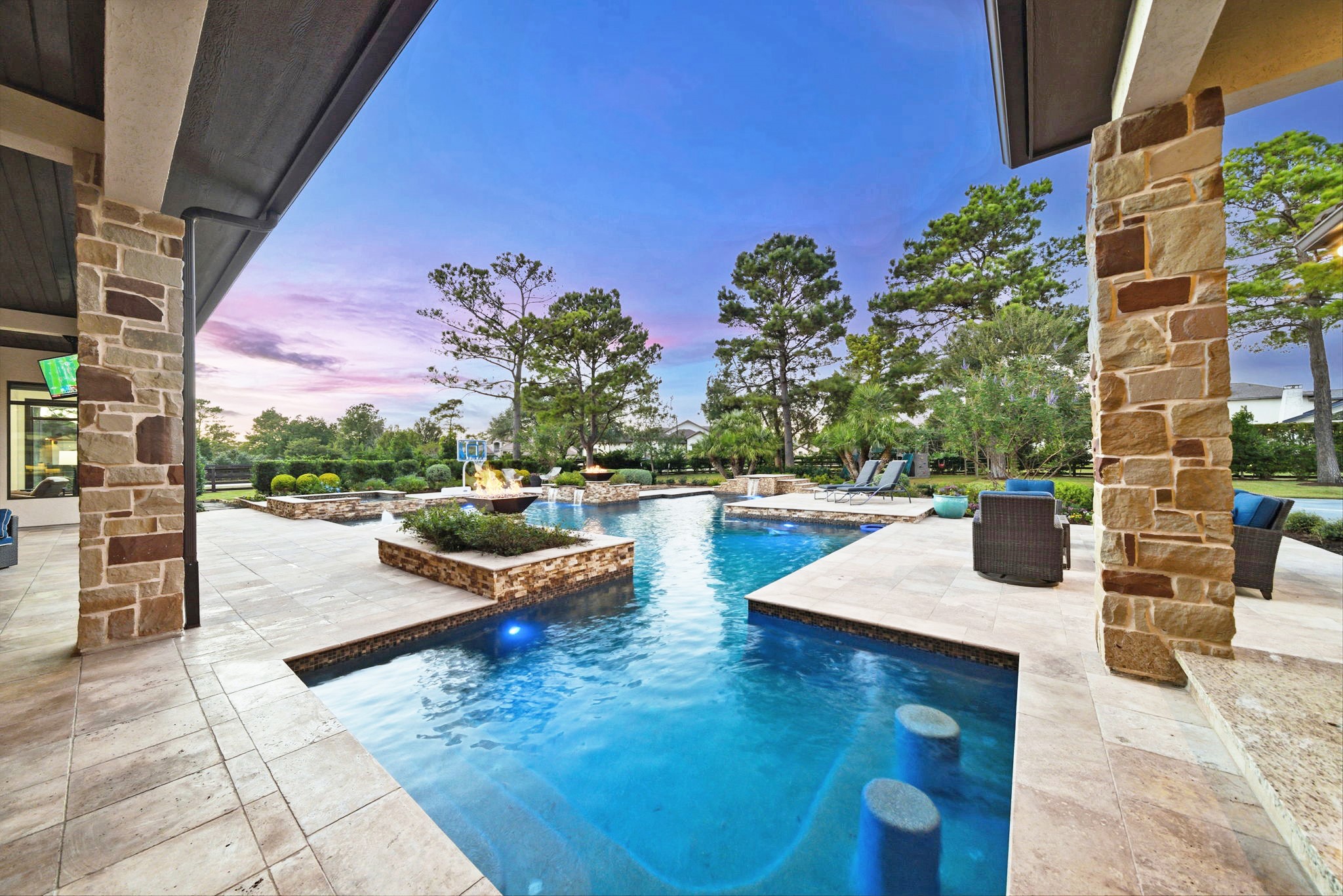 15 Royal King Road Tomball, TX 77377 - Photo 39 of 50 a view of a swimming pool with outdoor seating and plants