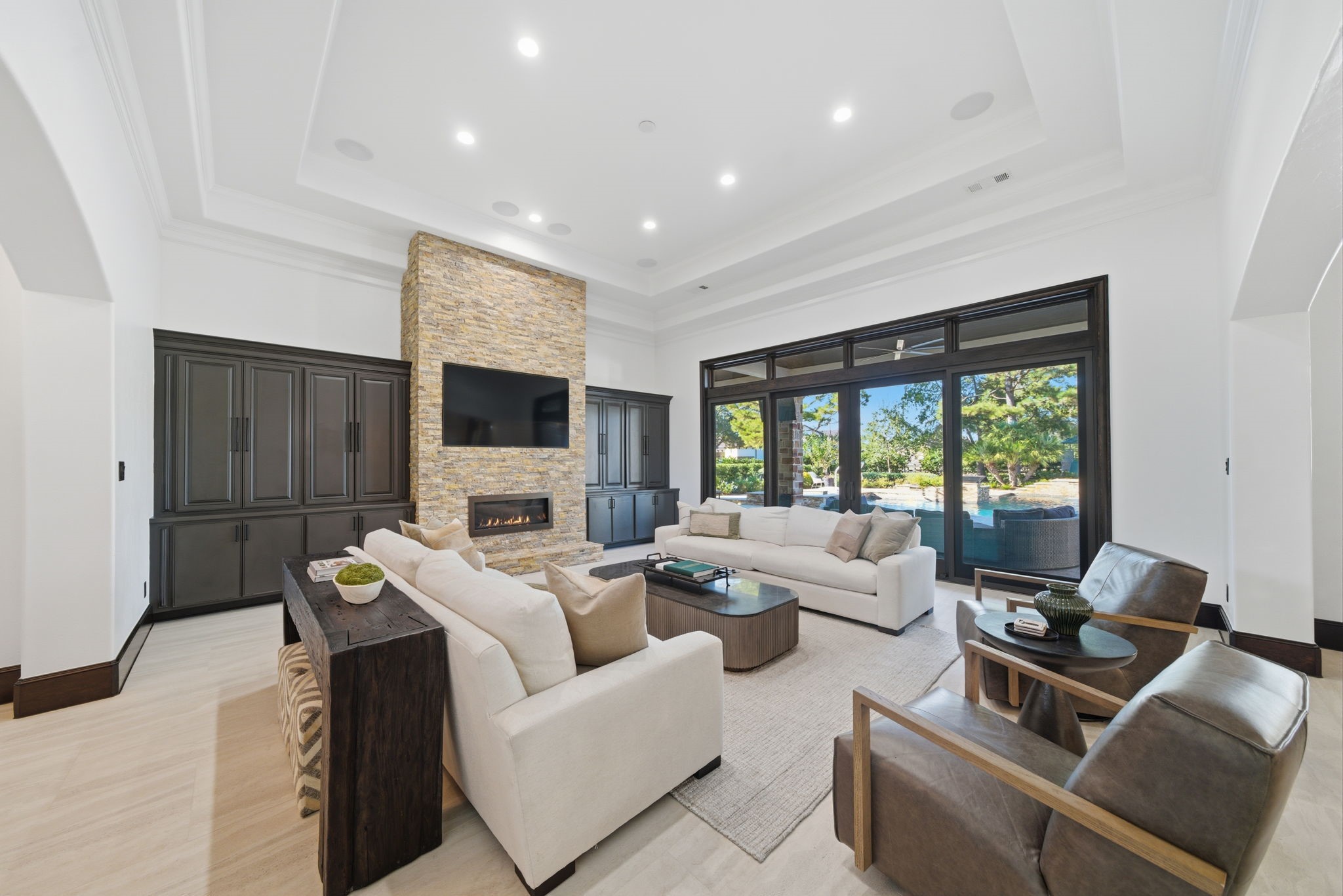 15 Royal King Road Tomball, TX 77377 - Photo 7 of 50 a living room with furniture large window and flat screen tv