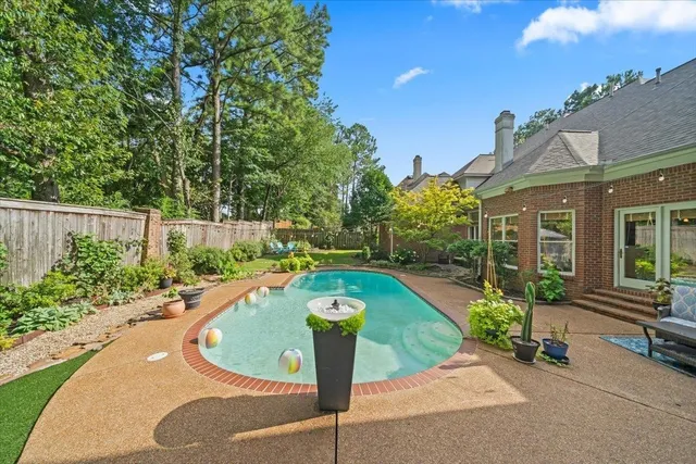 a house view with a garden space