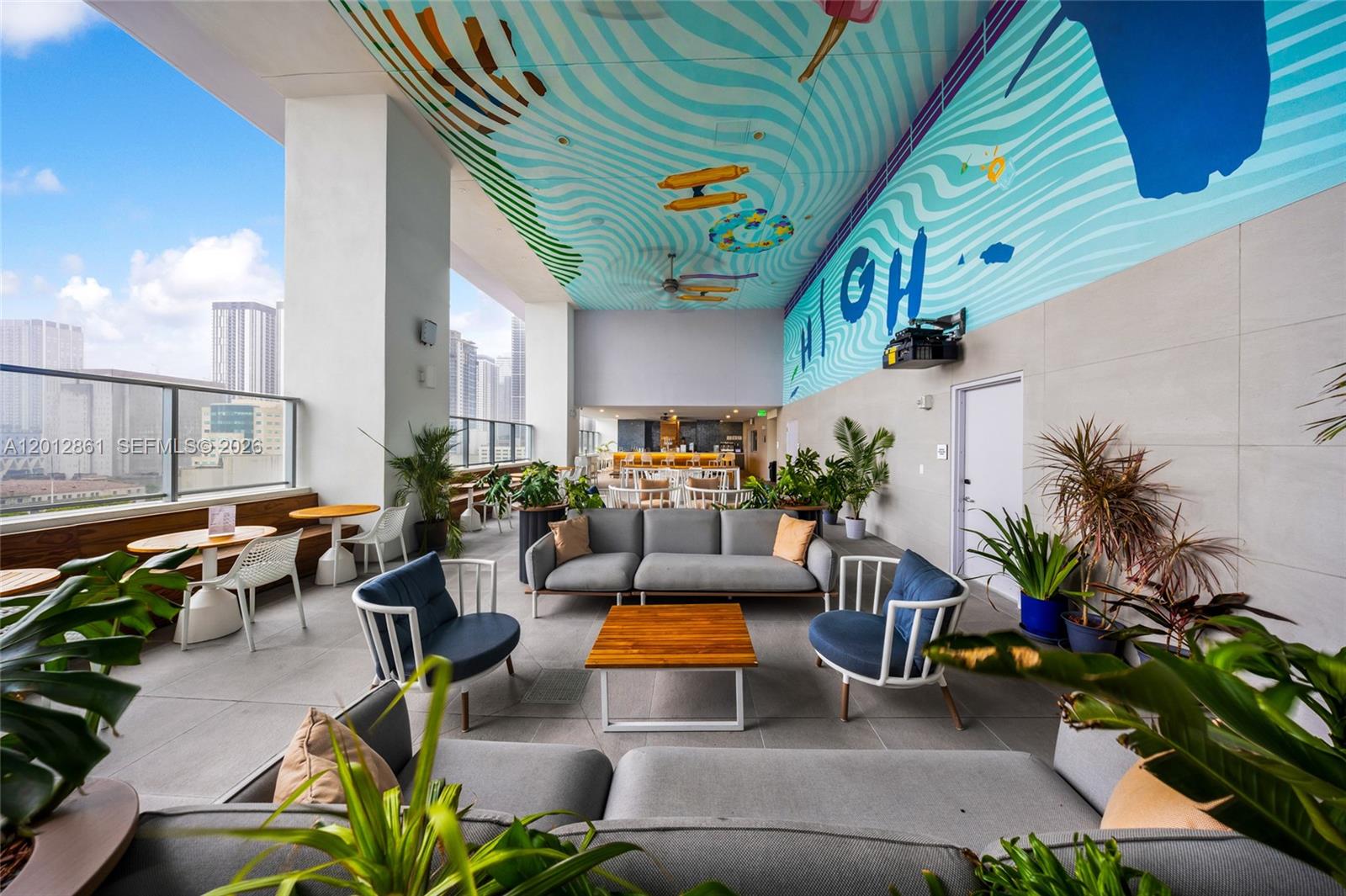 227 Northeast 2nd Street, Unit 1909 Miami, FL 33132 - Photo 11 of 18 a outdoor living space with patio furniture