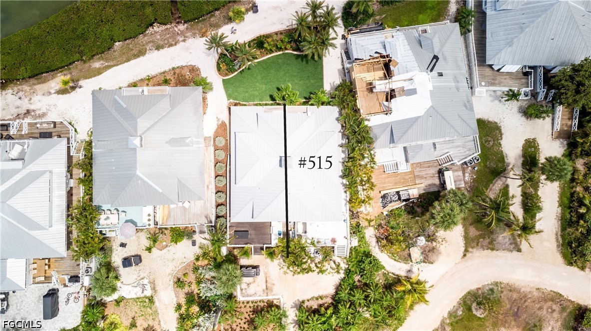 515 Useppa Useppa Island Bokeelia, FL 33922 - Photo 5 of 43 an aerial view of residential houses with outdoor space