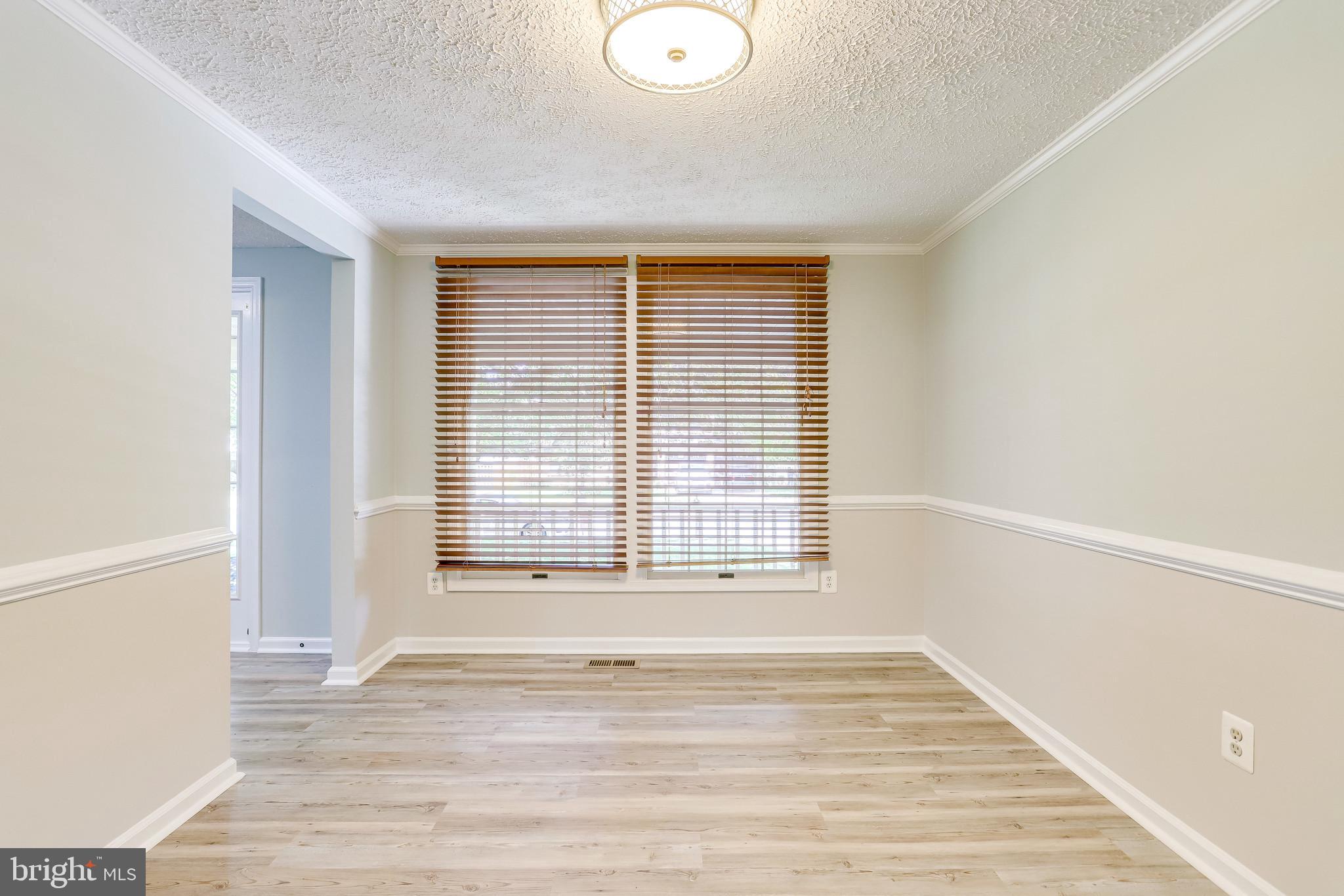 12307 Streamvale Circle Herndon, VA 20170 - Photo 18 of 78 Formal Dining - New Floors