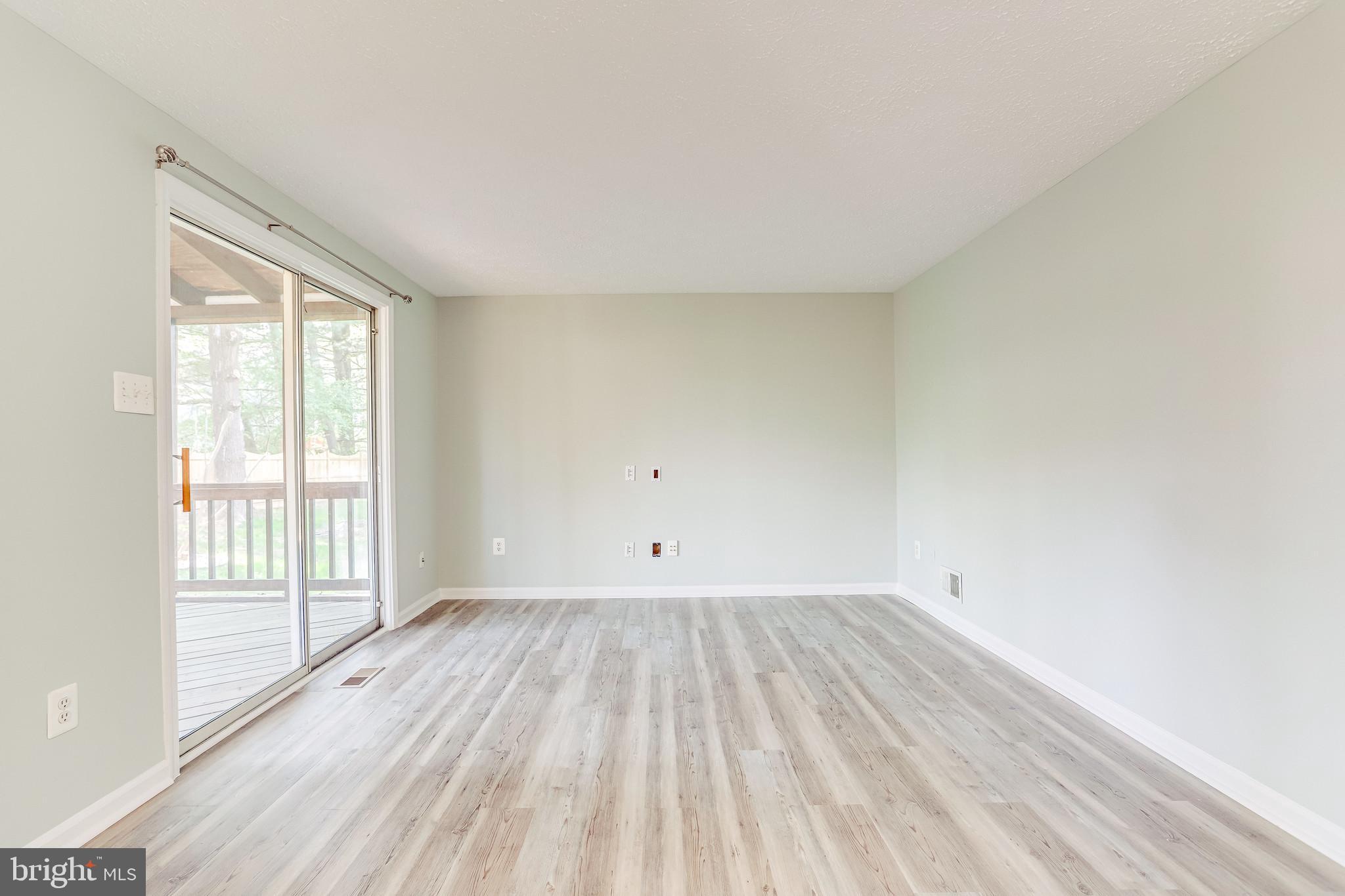 12307 Streamvale Circle Herndon, VA 20170 - Photo 30 of 78 Family room - Access to covered porch