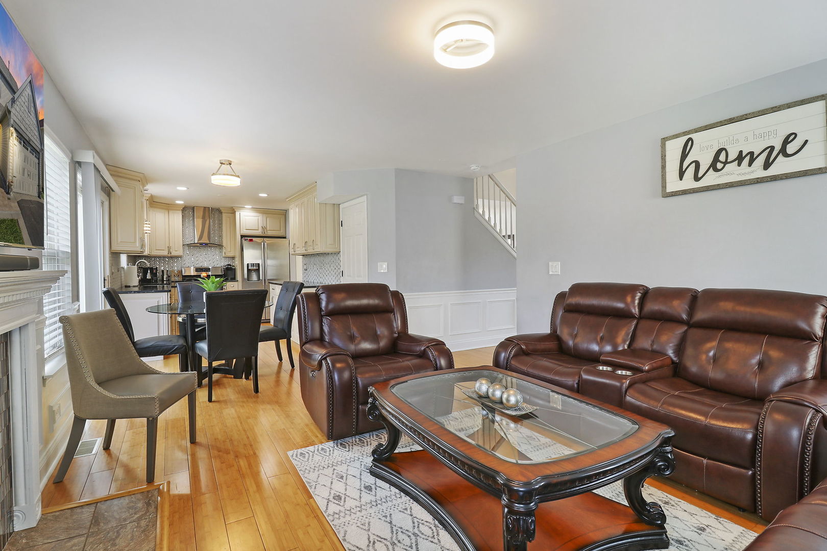 5511 Windgate Way Lake In The Hills, IL 60156 - Photo 12 of 30 a living room with furniture and a wooden floor