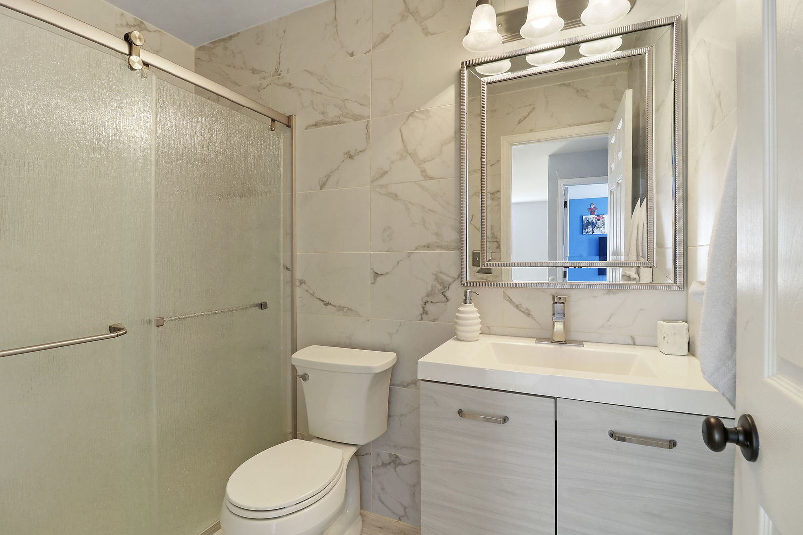 5511 Windgate Way Lake In The Hills, IL 60156 - Photo 15 of 30 a bathroom with a sink toilet and shower