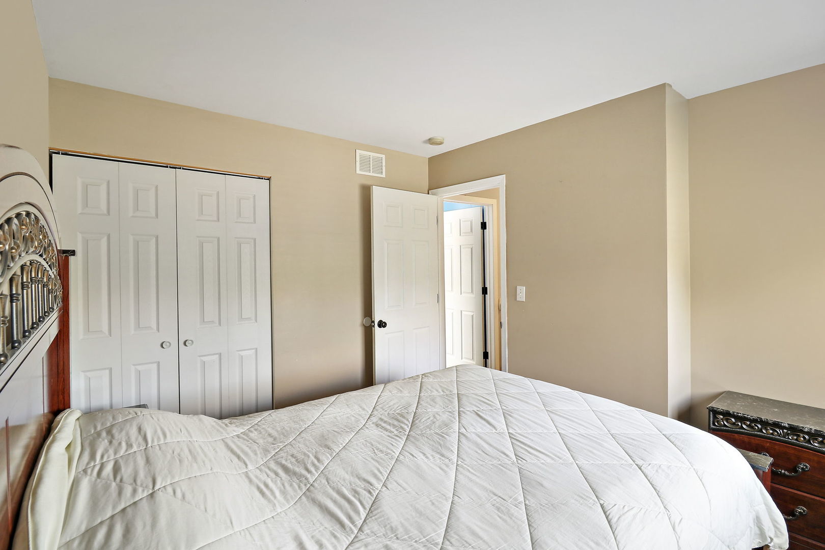 5511 Windgate Way Lake In The Hills, IL 60156 - Photo 17 of 30 a bedroom with a bed and a closet