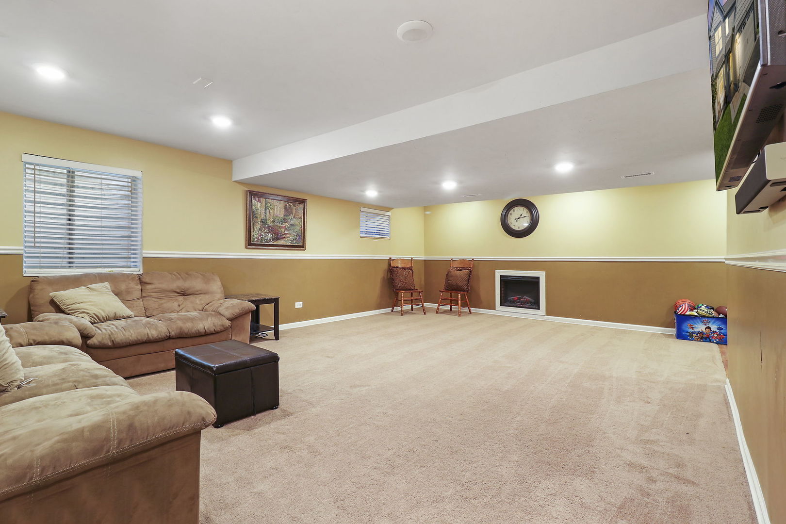 5511 Windgate Way Lake In The Hills, IL 60156 - Photo 20 of 30 a living room with furniture and a large window