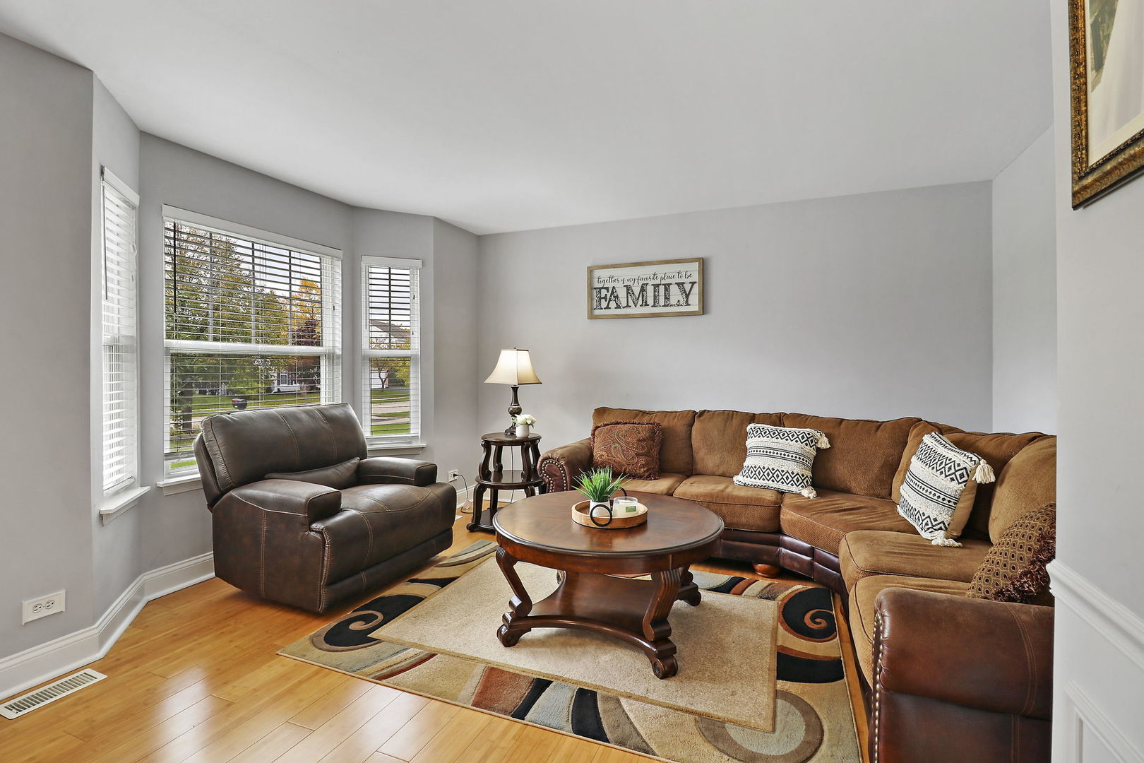 5511 Windgate Way Lake In The Hills, IL 60156 - Photo 2 of 30 a living room with furniture and a window