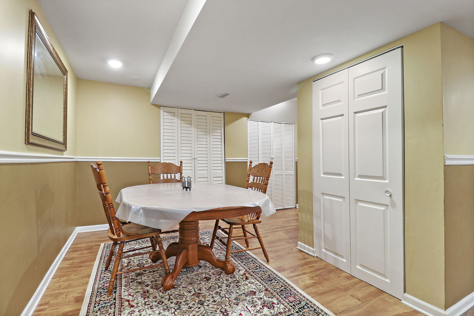 5511 Windgate Way Lake In The Hills, IL 60156 - Photo 22 of 30 a view of a dining room with furniture and wooden floor