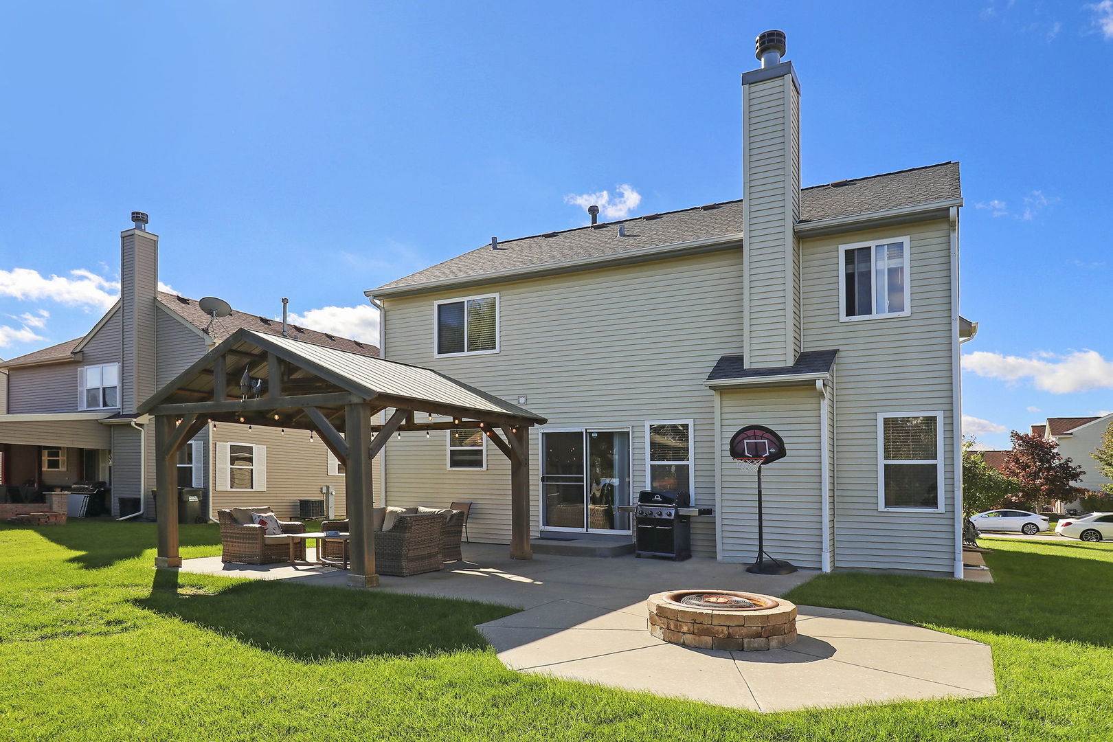 5511 Windgate Way Lake In The Hills, IL 60156 - Photo 27 of 30 a front view of a house with garden