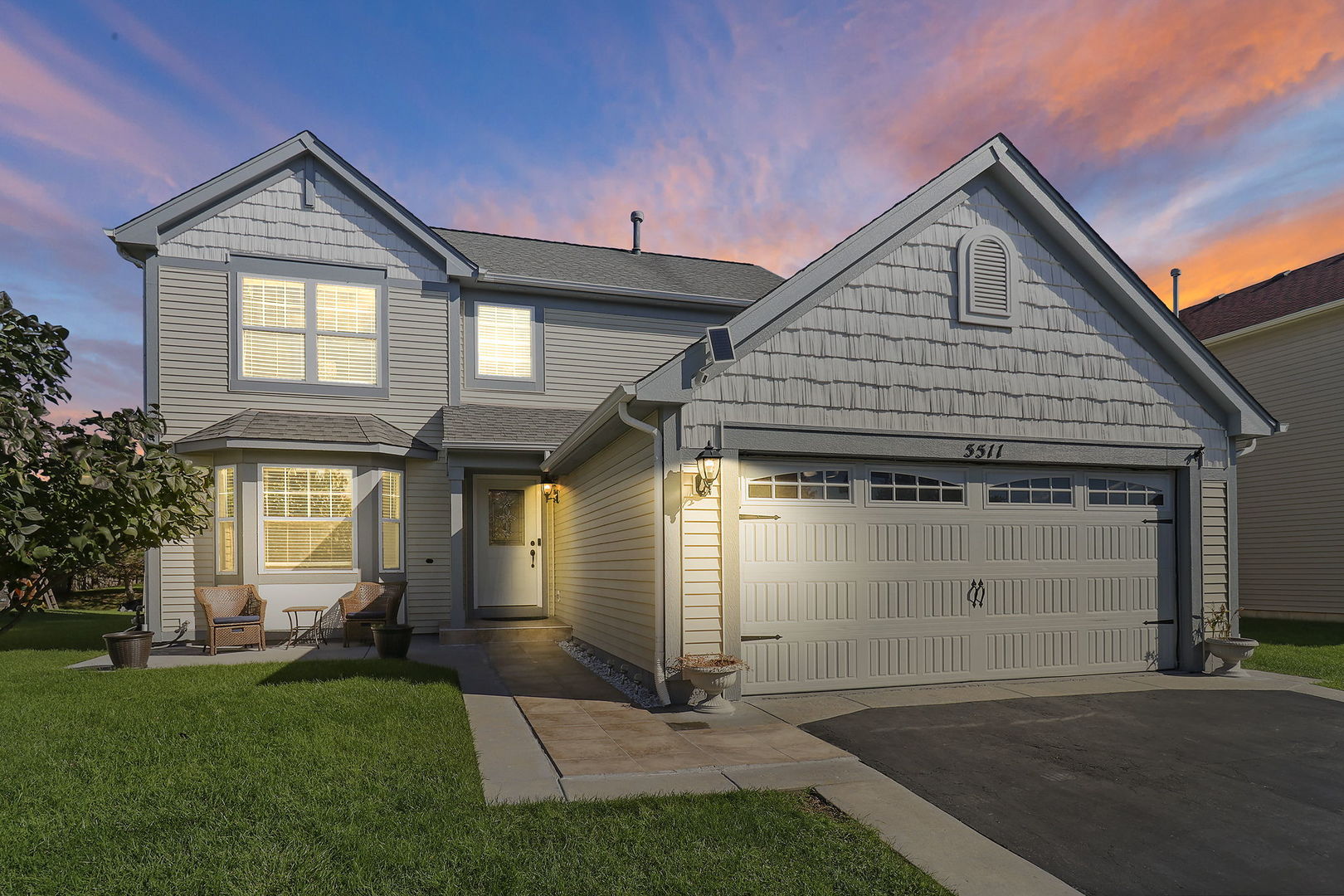 5511 Windgate Way Lake In The Hills, IL 60156 - Photo 30 of 30 a front view of a house with a yard