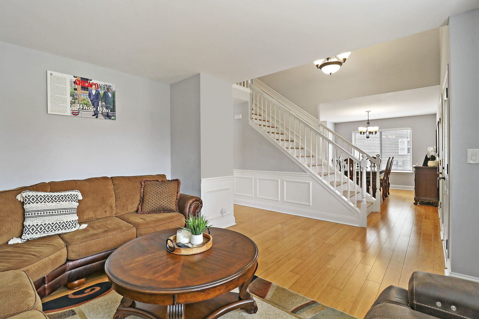 5511 Windgate Way Lake In The Hills, IL 60156 - Photo 3 of 30 a living room with furniture and a dining table