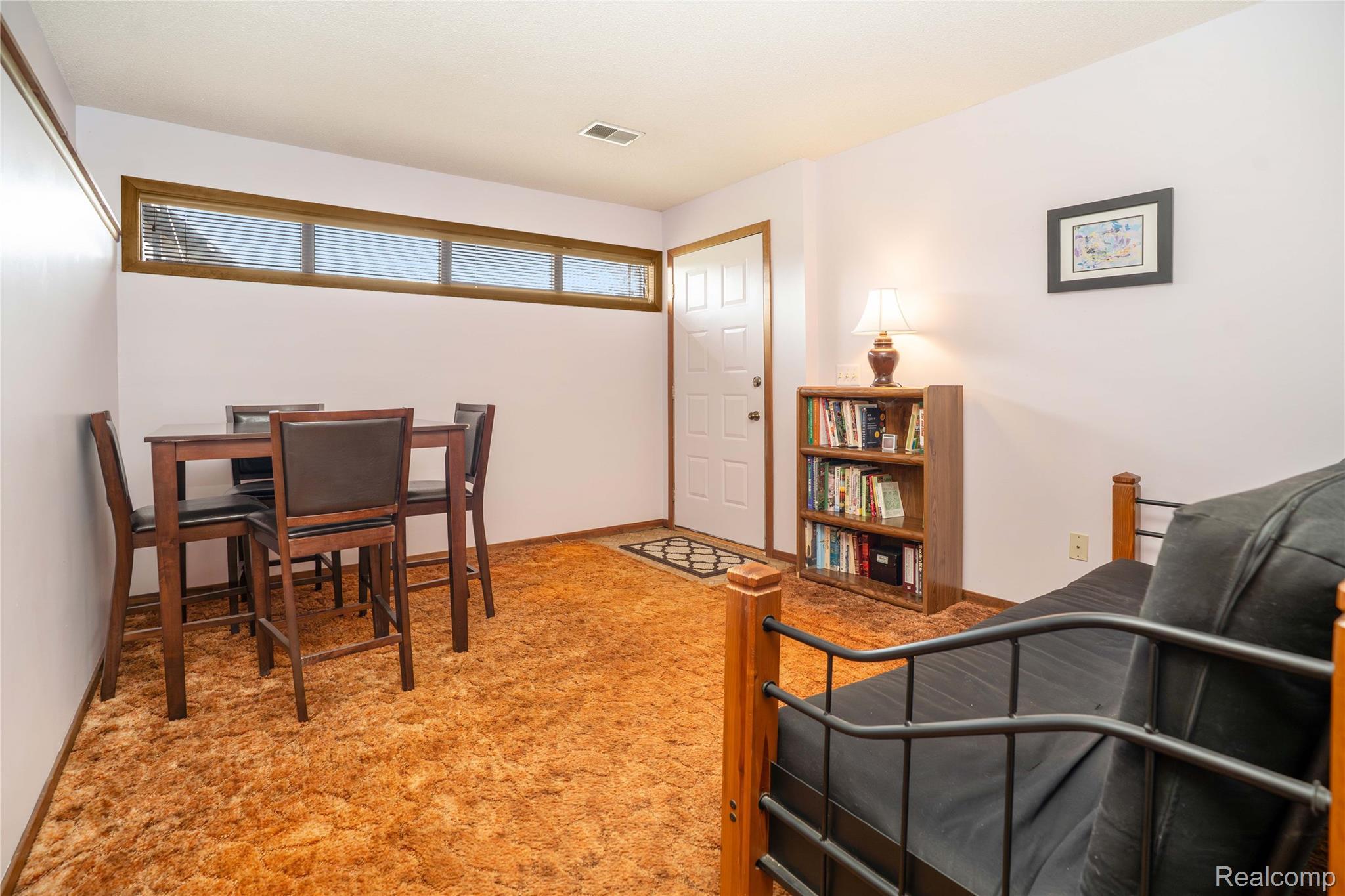 2725 Cooley Lake Road Highland, MI 48356 - Photo 46 of 67 Lower level family room