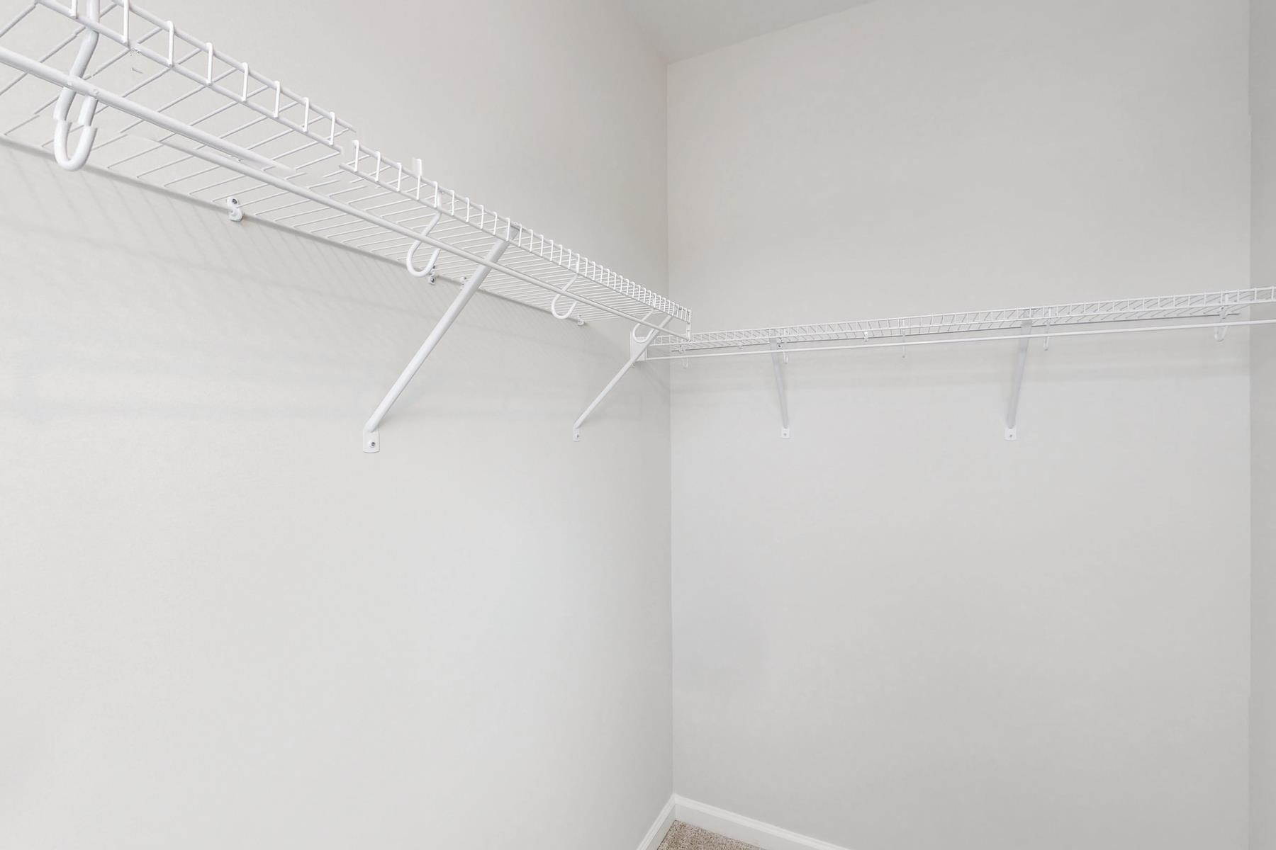 1007 Harmony Trail, Unit 16 Durham, NC 27703 - Photo 21 of 37 a view of a room with racks on the wall