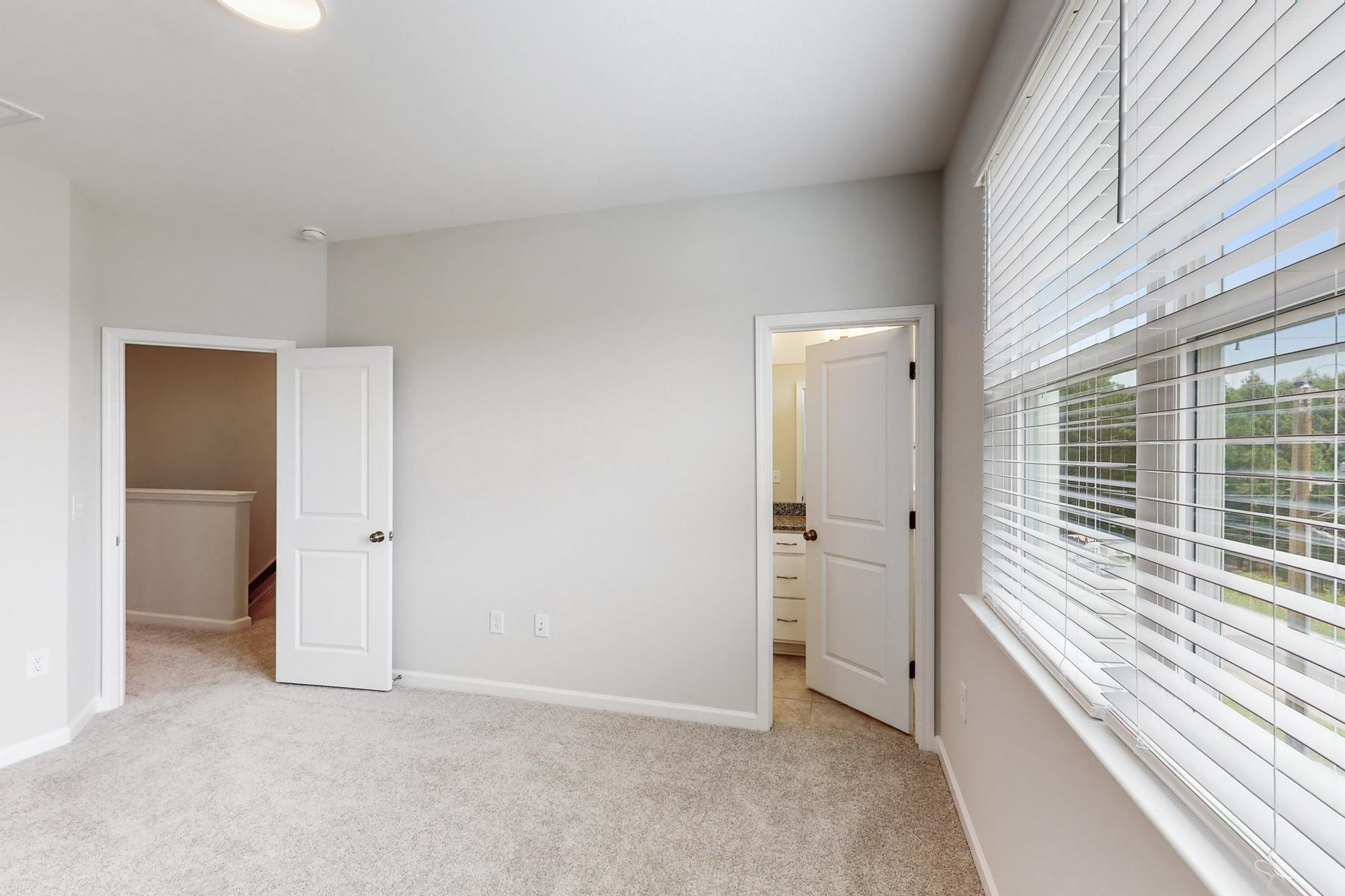 1007 Harmony Trail, Unit 16 Durham, NC 27703 - Photo 28 of 37 a view of an empty room with a window