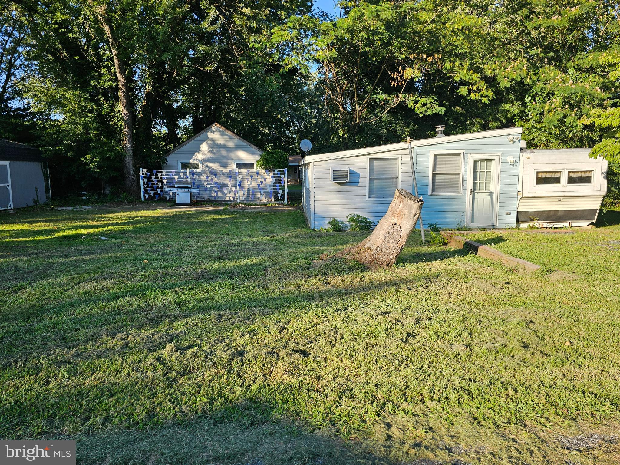 273-272 Teton Lane, Unit GLEN 9 Earleville, MD 21919 - Photo 2 of 3 a view of a house with backyard and sitting area
