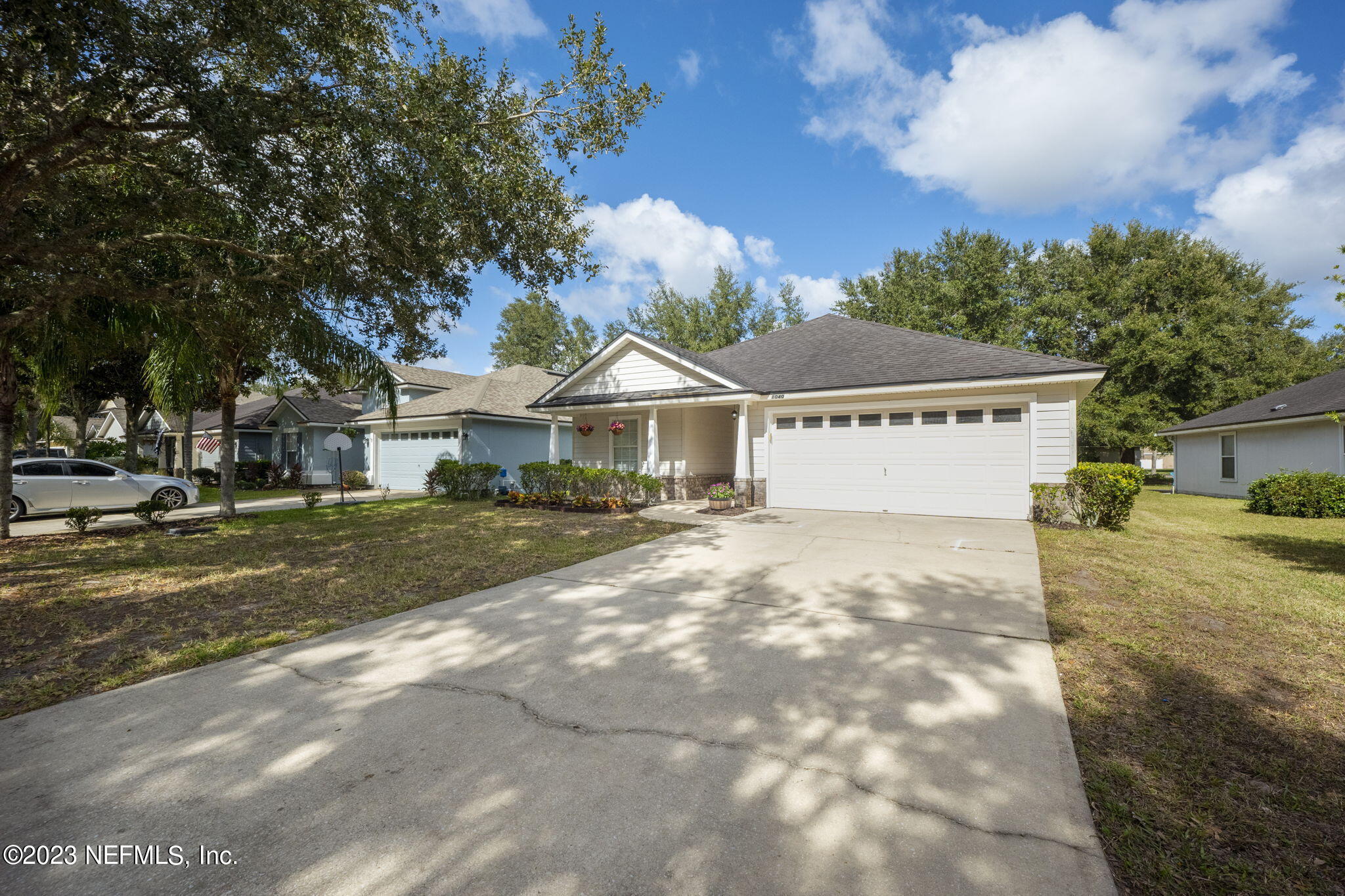 1040 Three Forks Court St. Augustine, FL 32092 - Photo 1 of 58 a view of a house with a yard