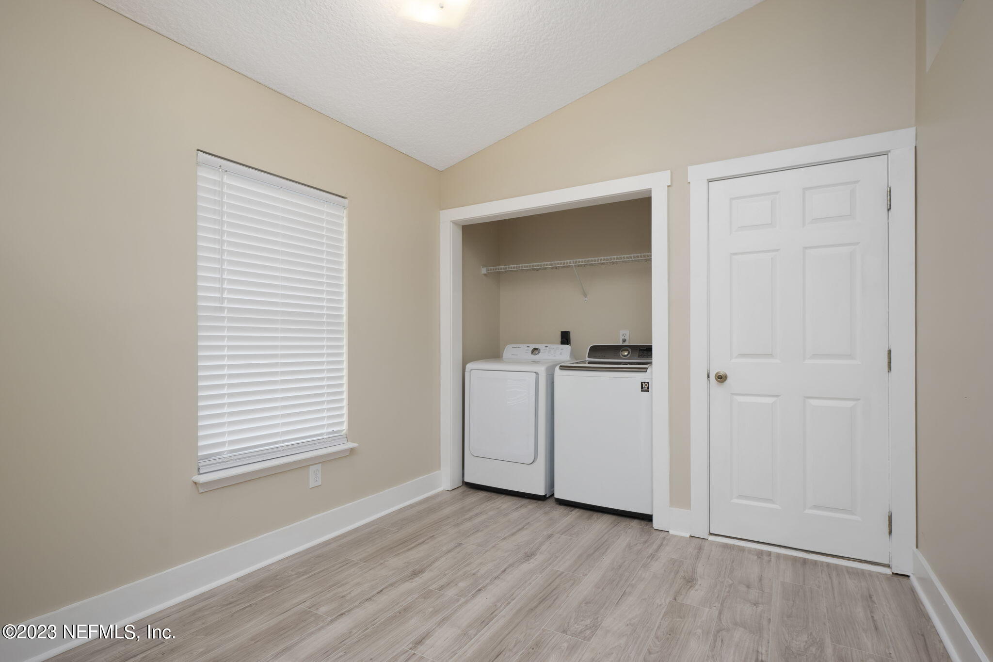 1040 Three Forks Court St. Augustine, FL 32092 - Photo 19 of 58 wooden floor in an empty room and a window