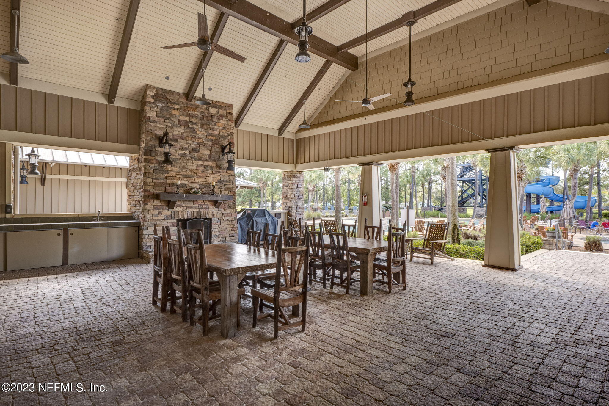 1040 Three Forks Court St. Augustine, FL 32092 - Photo 49 of 58 a dining room with furniture water view and a floor to ceiling window
