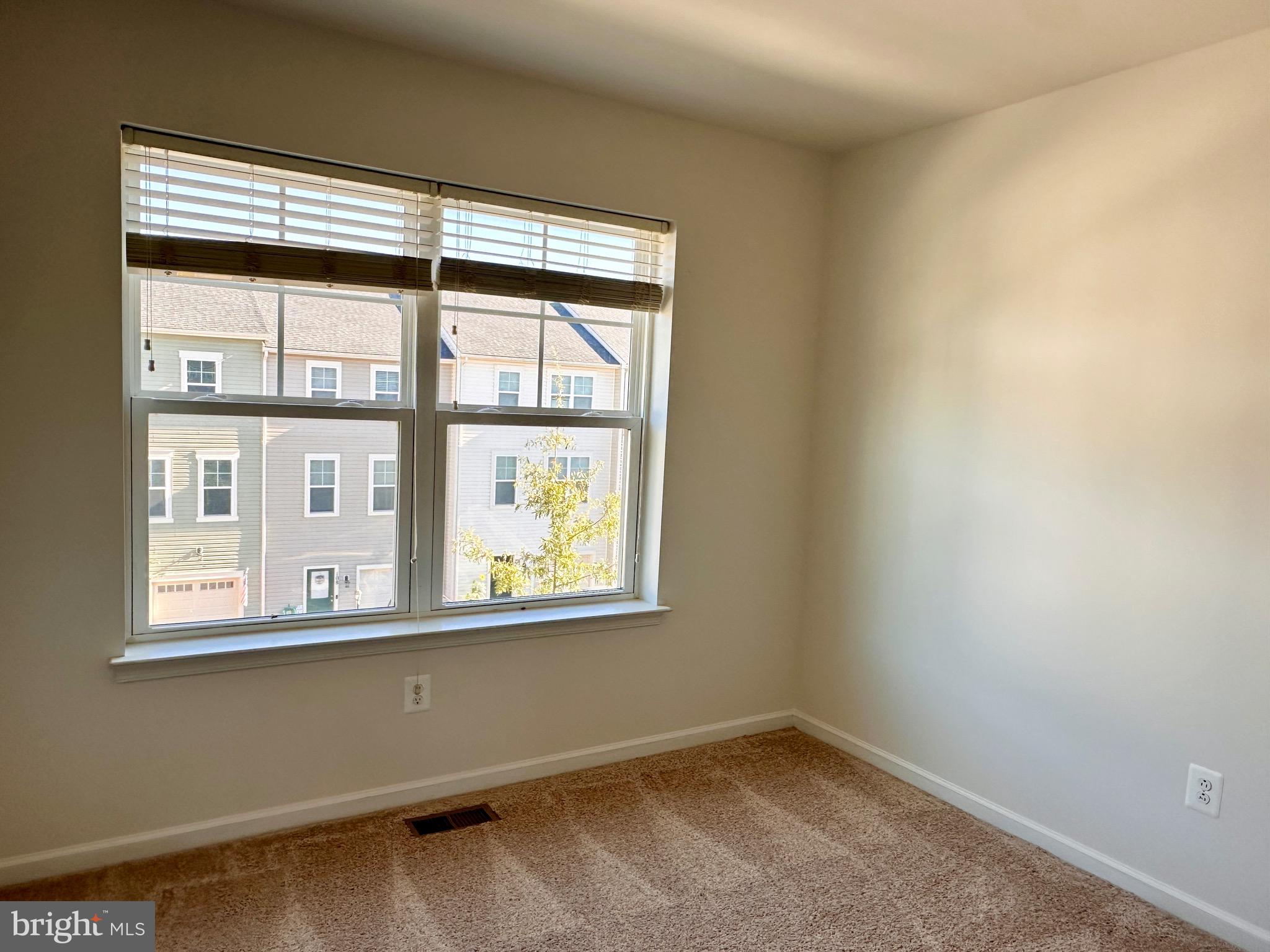 111 Fading Star Court Stephenson, VA 22656 - Photo 20 of 25 an empty room with a window