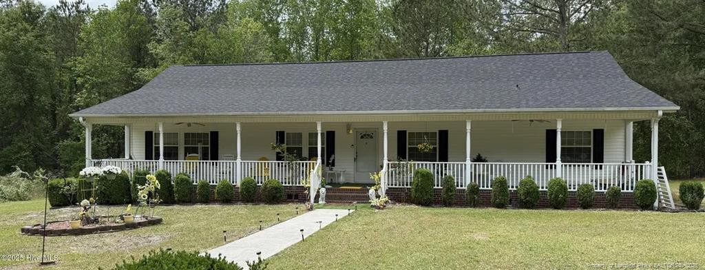 front view of a house with a yard