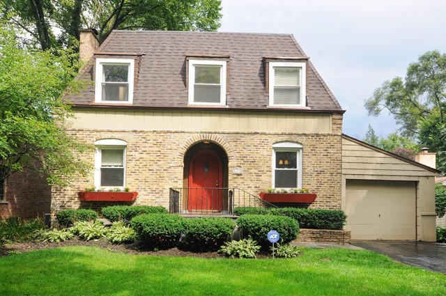 2138 Illinois Road Northbrook, IL 60062 - Photo 1 of 15 a front view of a house with a yard