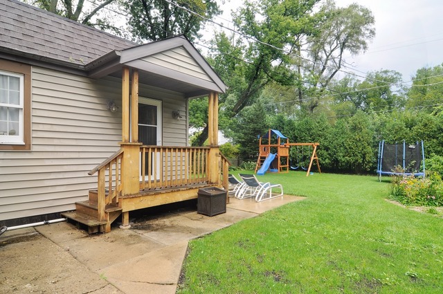 2138 Illinois Road Northbrook, IL 60062 - Photo 15 of 15 a view of backyard with deck and garden