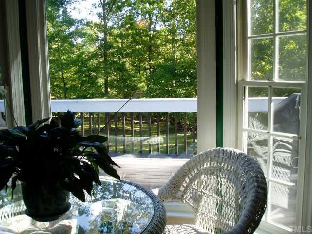 12000 Peed Road Raleigh, NC 27614 - Photo 10 of 12 Sunny breakfast area with view across deck .