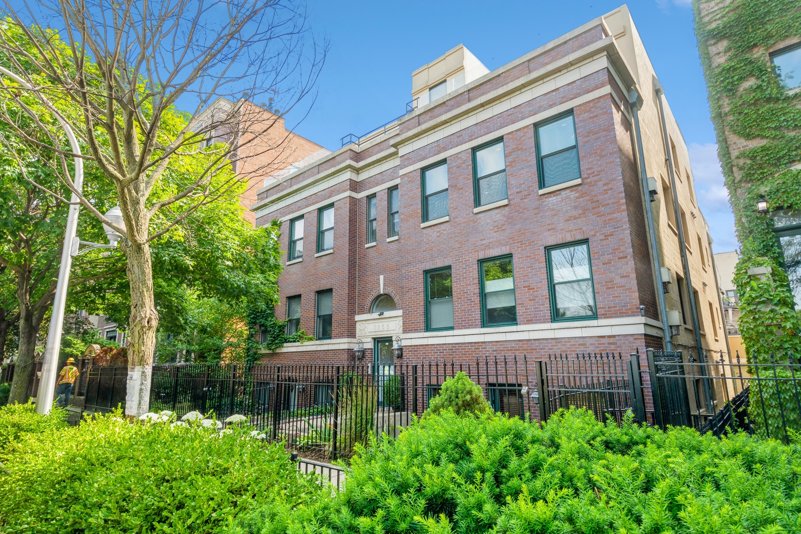 1355 North Mohawk Street, Unit 3S Chicago, IL 60610 - Photo 1 of 18 a view of a brick building next to a yard
