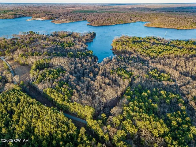 view of a lake with an outdoor space