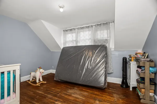 a room with a window and gym equipment
