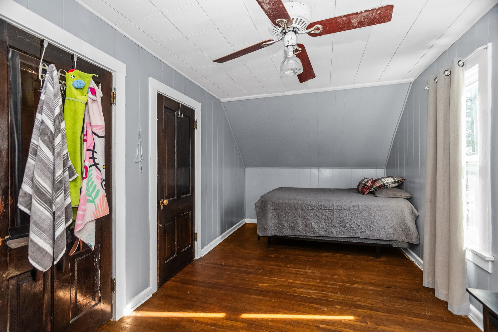 2514 Walnut Street Blue Island, IL 60406 - Photo 7 of 15 a bedroom with a bed and a book shelf