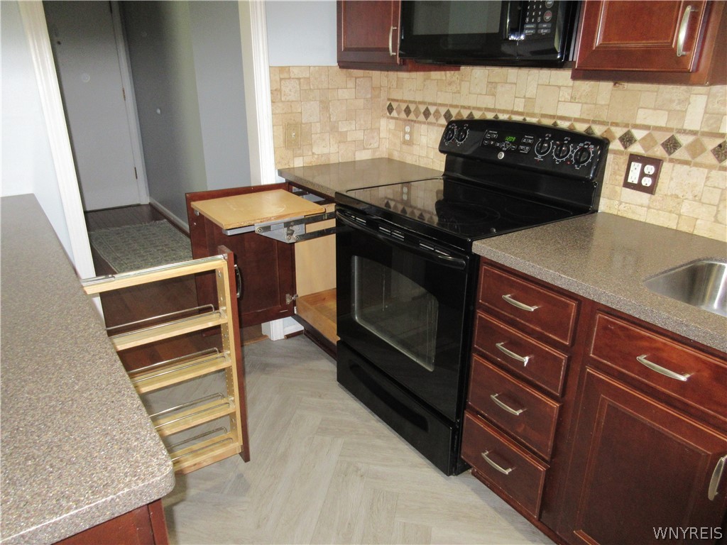 345 South Cayuga Road, Unit A Amherst, NY 14221 - Photo 7 of 24 Custom spice rack and Mix Master Station