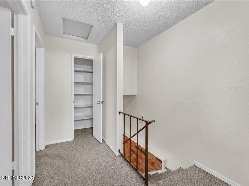 820 Jamaica Avenue, Unit 3 Reno, NV 89502 - Photo 14 of 19 a view of a hallway with seating area