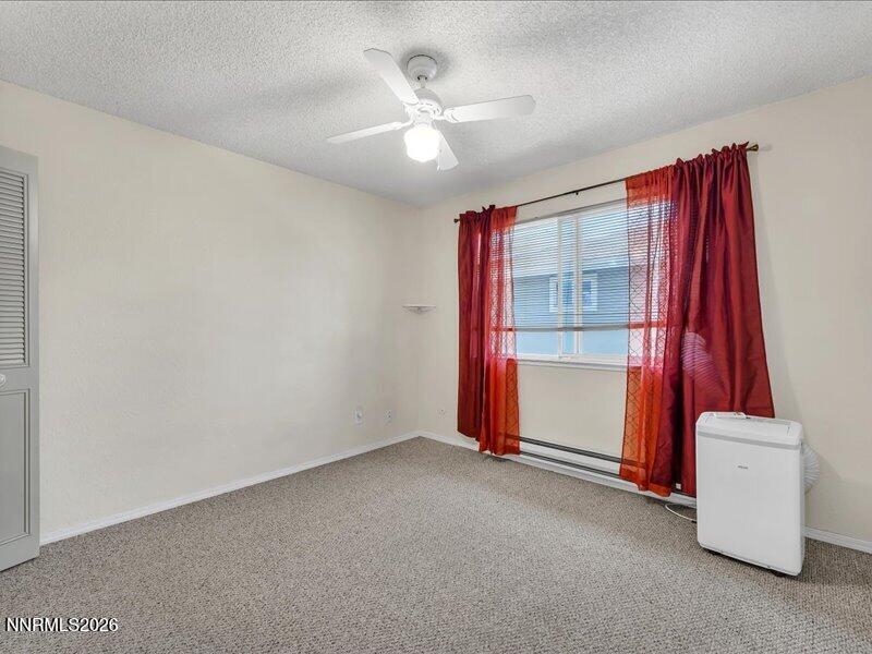820 Jamaica Avenue, Unit 3 Reno, NV 89502 - Photo 18 of 19 an empty room with closet and entryway