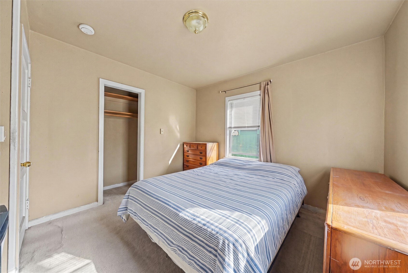 204 E Street Southwest Ephrata, WA 98823 - Photo 11 of 31 a bedroom with a bed and a window