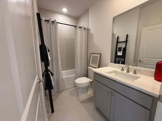 a view of a swimming pool with a patio and a garden