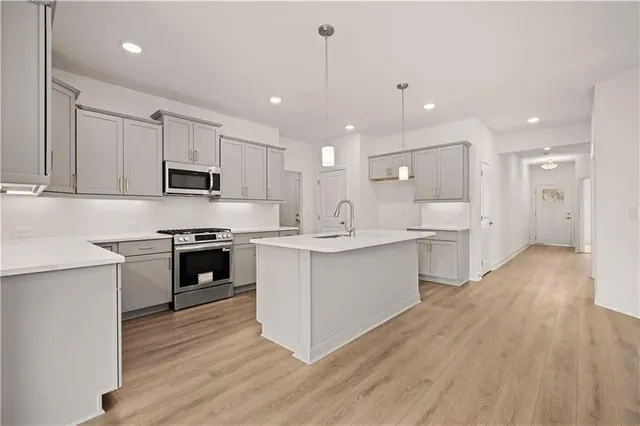 a front view of a house with a lake view