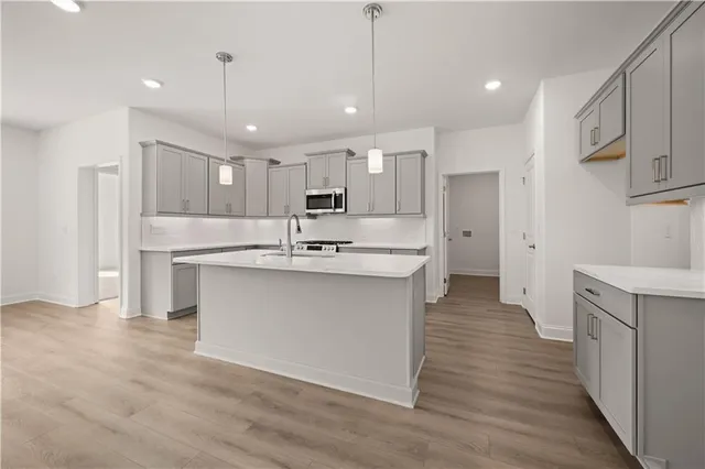 a view of a patio with dining table and chairs with plants