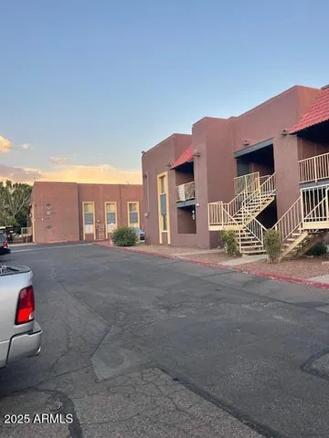 a view of a street with cars