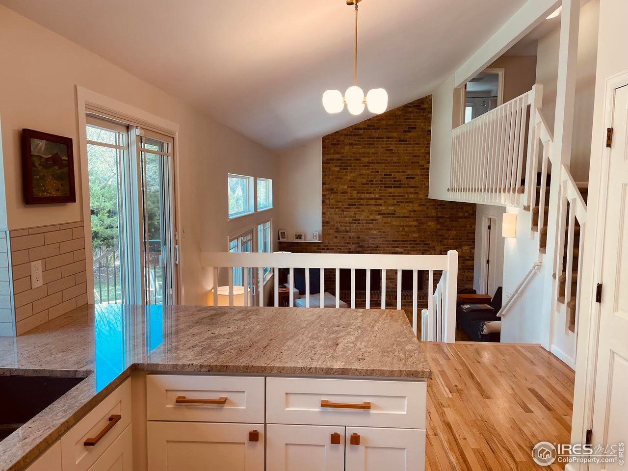 4303 30th Street Boulder, CO 80301 - Photo 11 of 37 a kitchen view with granite countertop a window