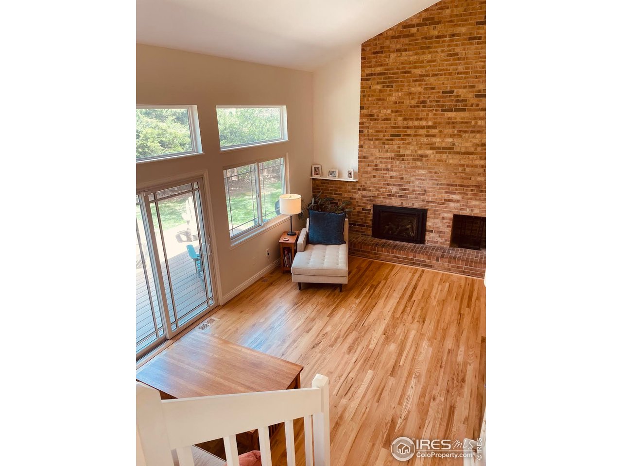 4303 30th Street Boulder, CO 80301 - Photo 16 of 37 a living room with furniture and a fireplace