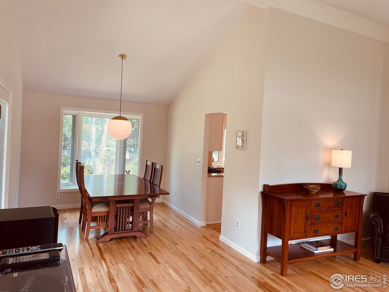 4303 30th Street Boulder, CO 80301 - Photo 19 of 37 a living room with furniture and a wooden floor