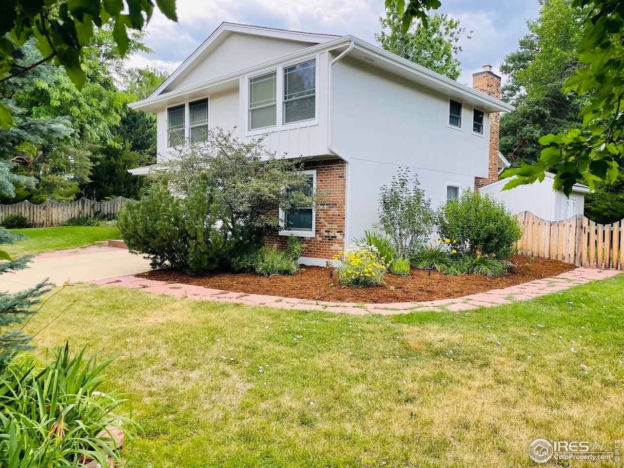 4303 30th Street Boulder, CO 80301 - Photo 2 of 37 a view of a house with backyard and garden