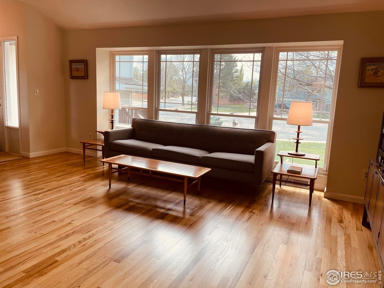 4303 30th Street Boulder, CO 80301 - Photo 21 of 37 a living room with furniture and a large window