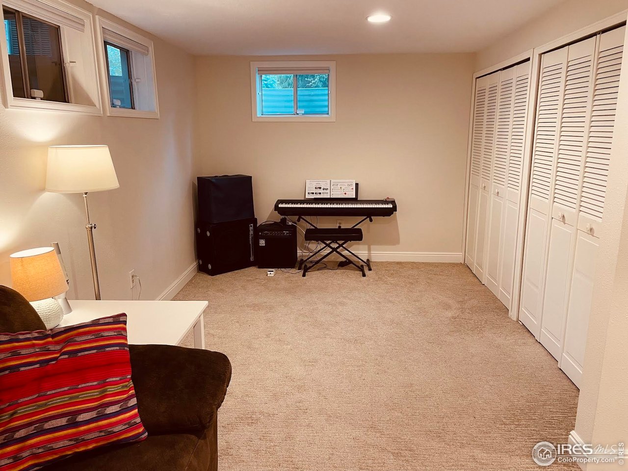 4303 30th Street Boulder, CO 80301 - Photo 36 of 37 a living room with furniture and a window