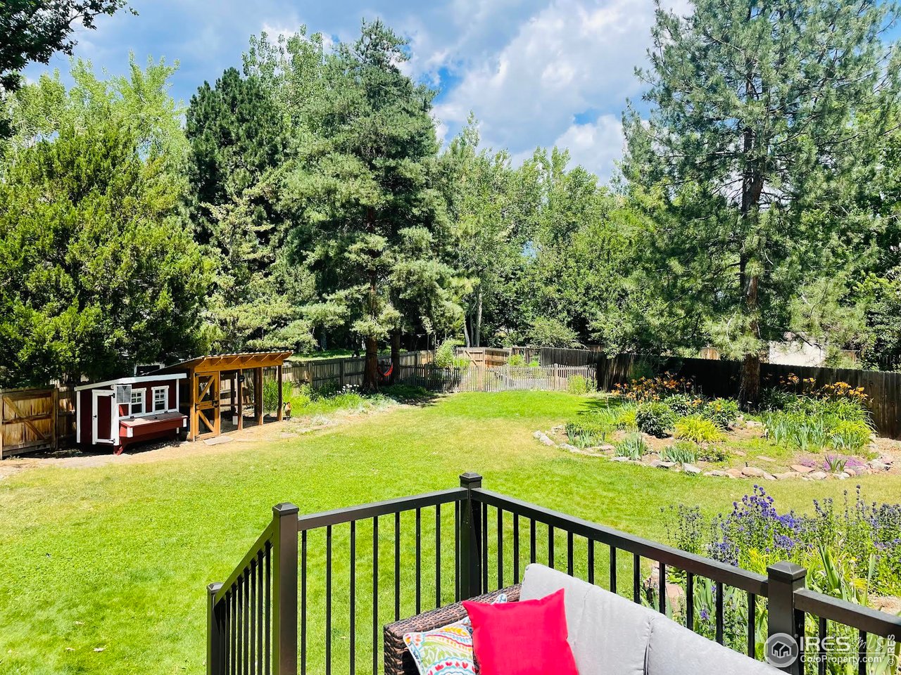 4303 30th Street Boulder, CO 80301 - Photo 5 of 37 a balcony with table and chairs