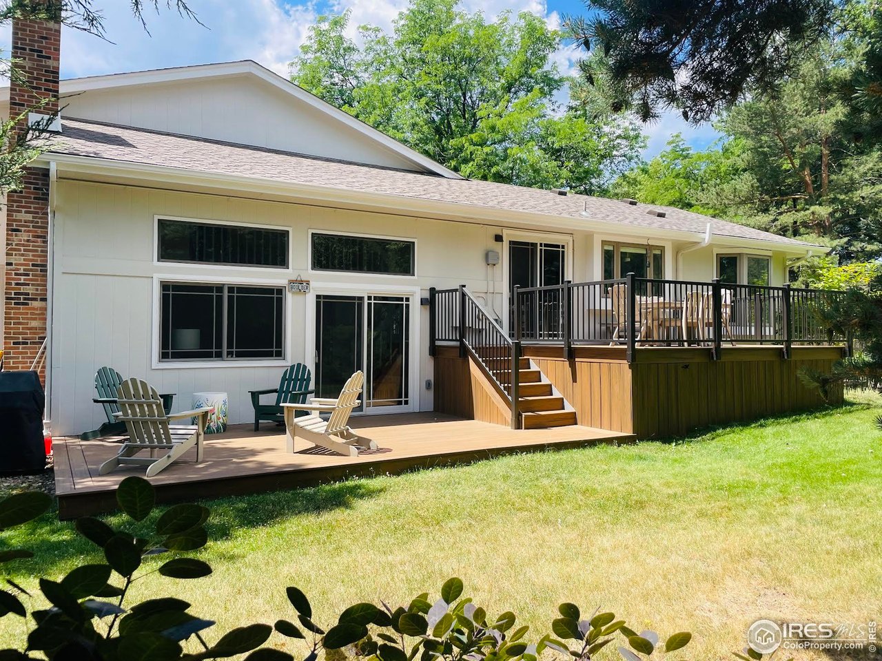 4303 30th Street Boulder, CO 80301 - Photo 9 of 37 a view of a house with swimming pool and porch