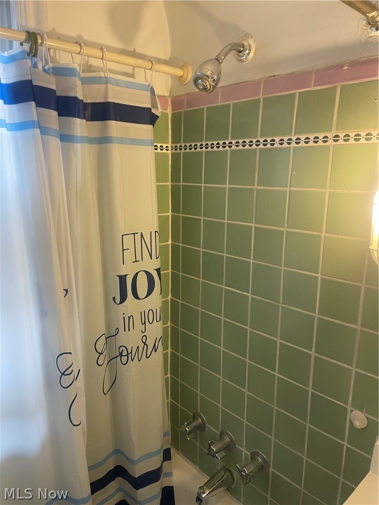 3645 Winchell Road Shaker Heights, OH 44122 - Photo 22 of 37 Bathroom with shower / bath combination with curtain